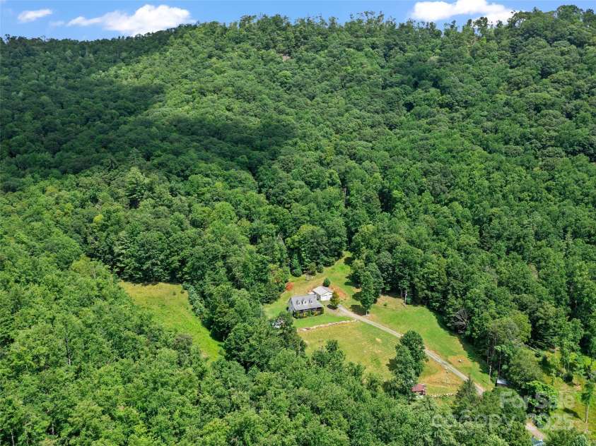 2216 Beans Creek Road, Bakersville, NC 28705.  MLS# CAR4289510, YatesRealty ID 30416. 
