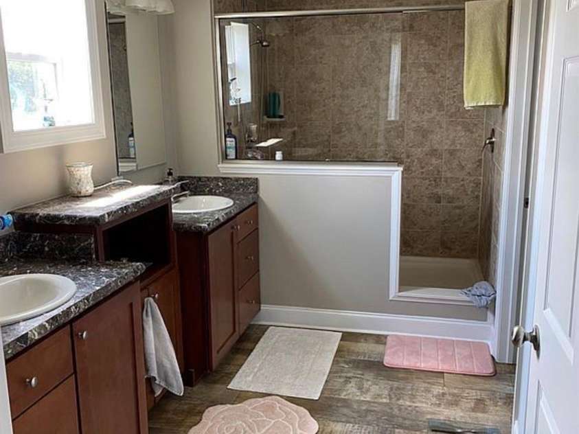 6042 Heavner Road, Vale, NC 28168.  MLS# CAR4393236, YatesRealty ID 30419. Secondary Residence Bathroom