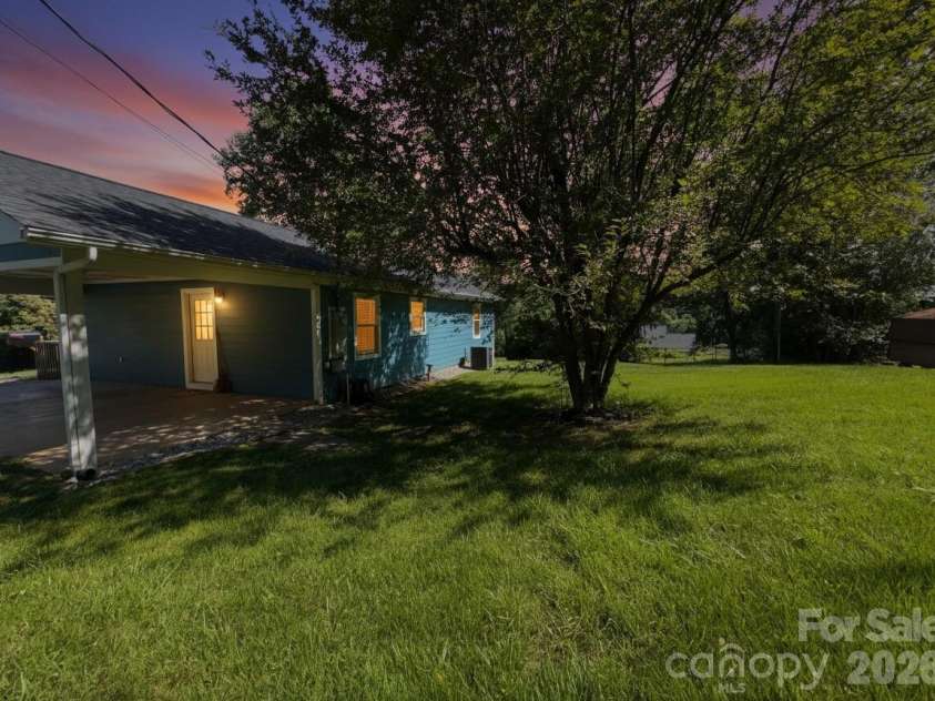 84 Hunt Drive, Nebo, NC 28761.  MLS# CAR4387996, YatesRealty ID 30420. AI twilight effect