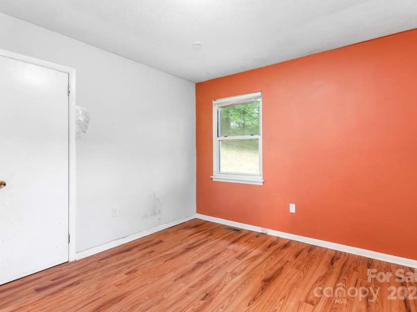 1 Eastcrest Drive, Fairview, NC 28730.  MLS# CAR4281826, YatesRealty ID 30421. Back bedroom