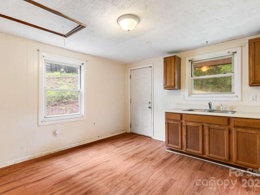 1 Eastcrest Drive, Fairview, NC 28730.  MLS# CAR4281826, YatesRealty ID 30421. Second kitchen/ utility room