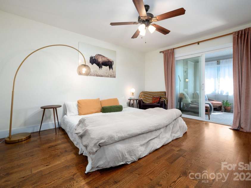 30 Greenwood Fields Drive, Asheville, NC 28804.  MLS# CAR4284220, YatesRealty ID 30424. Primary Ensuite Bedroom on Main Level