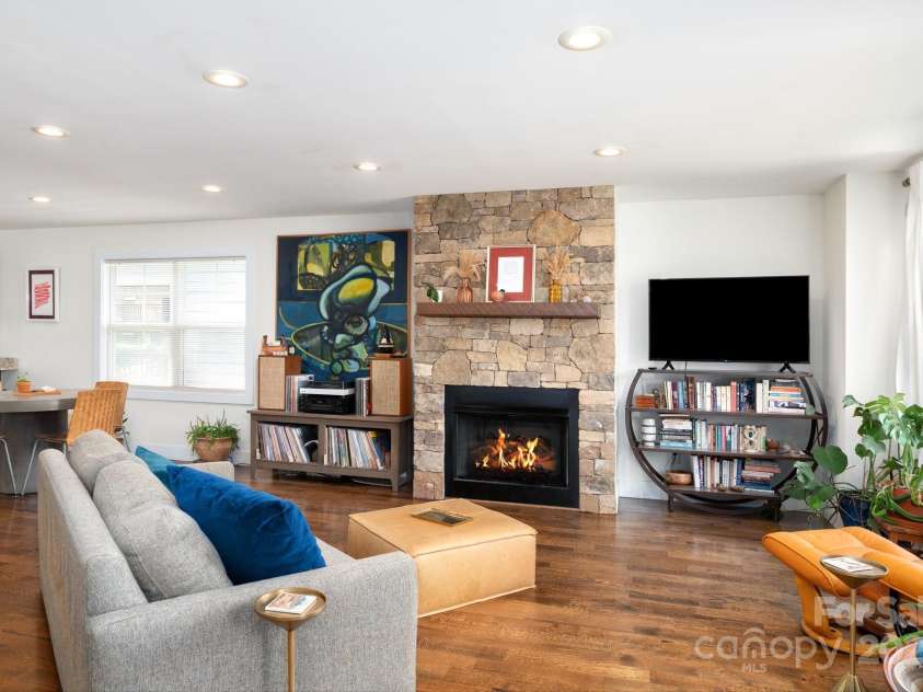 30 Greenwood Fields Drive, Asheville, NC 28804.  MLS# CAR4284220, YatesRealty ID 30424. Stone Surround Gas Fireplace
