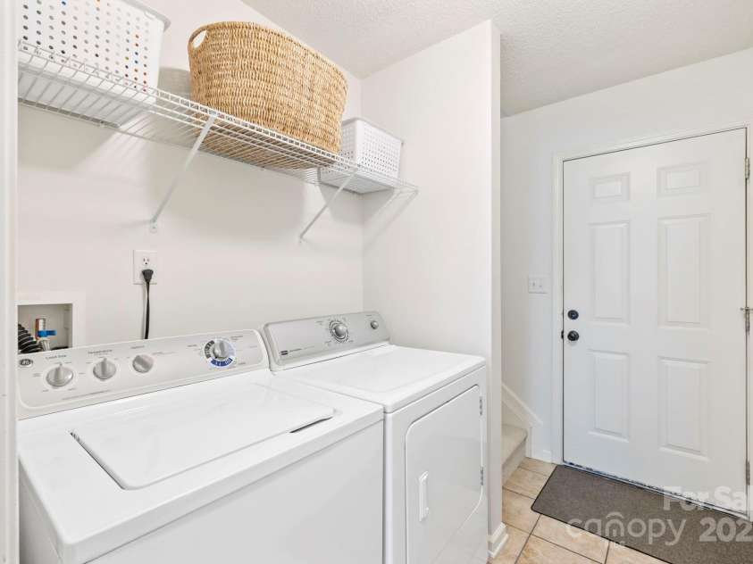 30 Morning Mist Road, Fletcher, NC 28732.  MLS# CAR4279362, YatesRealty ID 30428. Laundry room on main