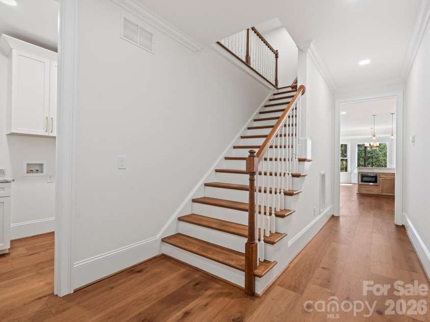 2024 Jumping Run, Connelly Springs, NC 28612.  MLS# CAR4336928, YatesRealty ID 3043. Stairway to upstairs bonus rooms