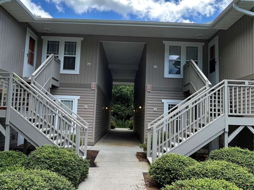 89 Morningside Lane, Hendersonville, NC 28792.  MLS# CAR4274796, YatesRealty ID 30430. Stairs to unit on right