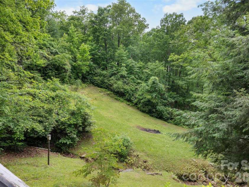125 Round Mountain Road, Brevard, NC 28747.  MLS# CAR4391140, YatesRealty ID 30437. 