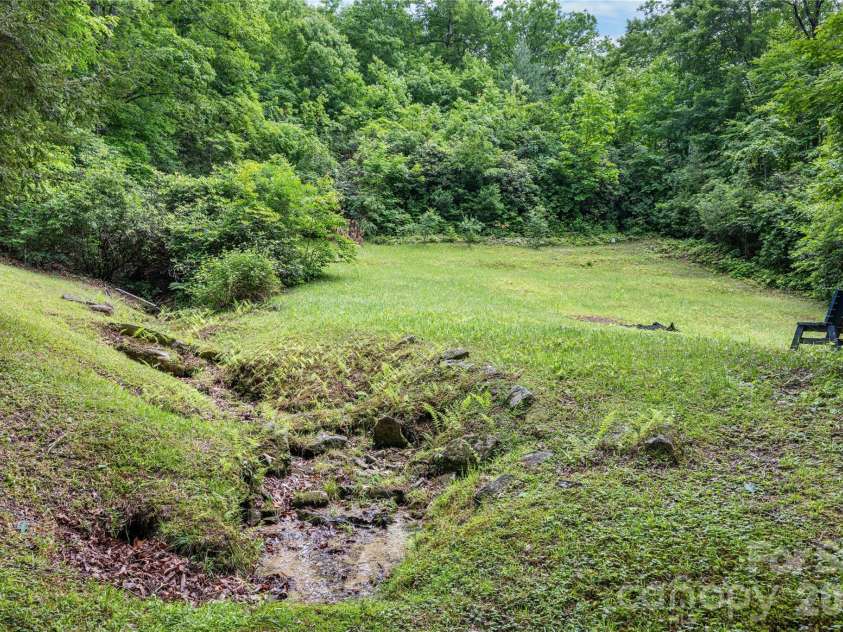 125 Round Mountain Road, Brevard, NC 28747.  MLS# CAR4391140, YatesRealty ID 30437. 