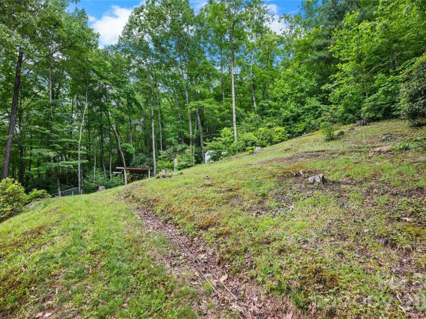 125 Round Mountain Road, Brevard, NC 28747.  MLS# CAR4391140, YatesRealty ID 30437. 