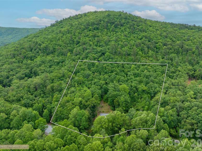 125 Round Mountain Road, Brevard, NC 28747.  MLS# CAR4391140, YatesRealty ID 30437. 