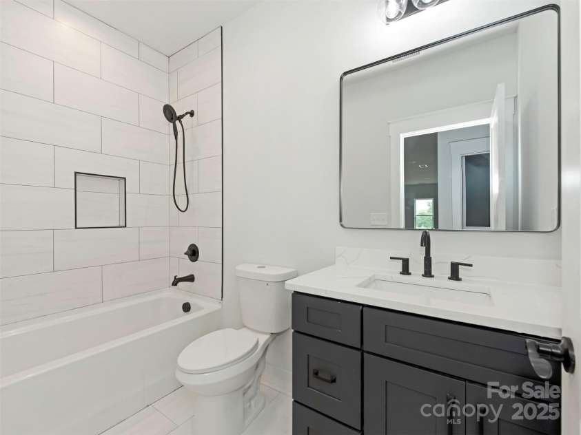 5105 Tom Starnes Road, Waxhaw, NC 28173.  MLS# CAR4274213, YatesRealty ID 30439. Hallway Bathroom