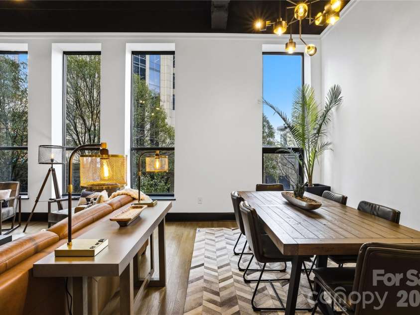 127 Tryon Street, Charlotte, NC 28202.  MLS# CAR4342911, YatesRealty ID 3044. Open Dining into Living