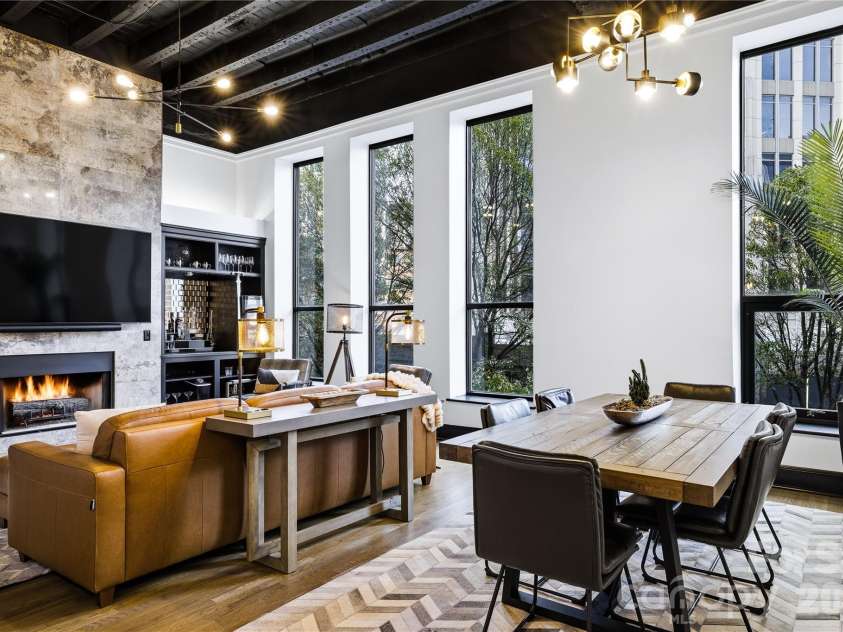 127 Tryon Street, Charlotte, NC 28202.  MLS# CAR4342911, YatesRealty ID 3044. Open Living with Fireplace