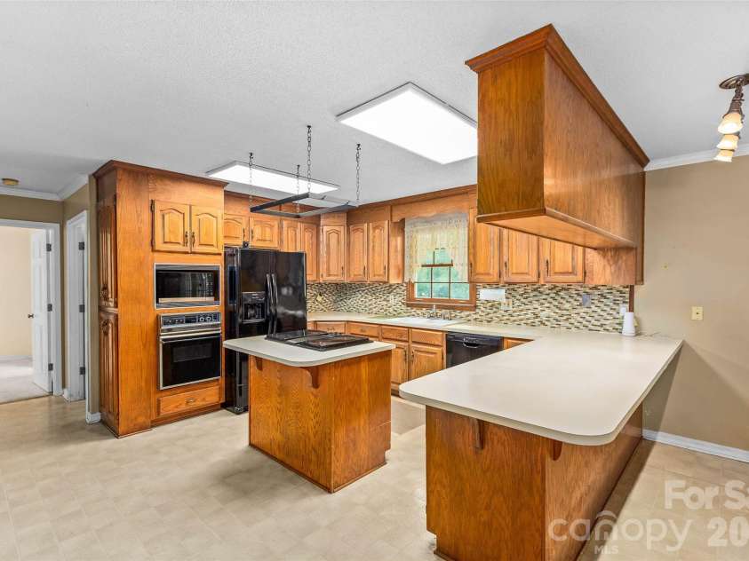 1719 Suther Road, Concord, NC 28025.  MLS# CAR4389080, YatesRealty ID 30444. 
