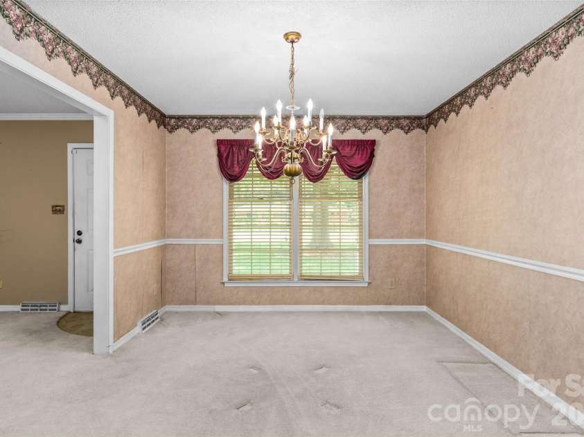 1719 Suther Road, Concord, NC 28025.  MLS# CAR4389080, YatesRealty ID 30444. 