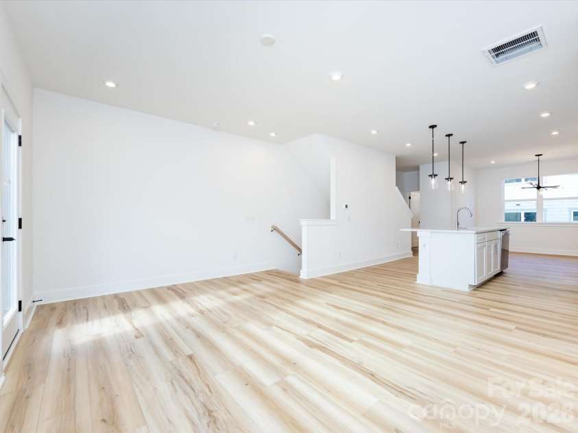 7022 Impulse Court, Charlotte, NC 28205.  MLS# CAR4349977, YatesRealty ID 30446. Light filled open concept living
