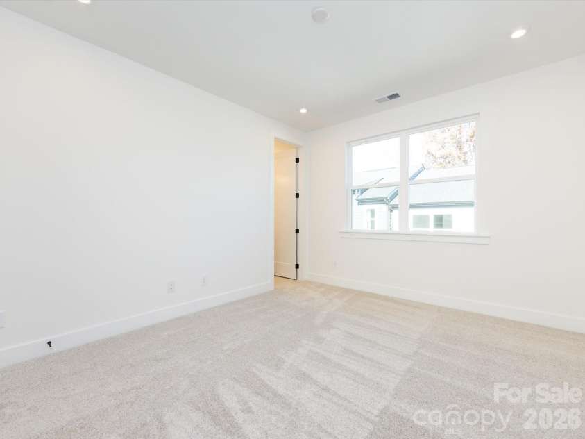 7022 Impulse Court, Charlotte, NC 28205.  MLS# CAR4349977, YatesRealty ID 30446. Light filled primary suite