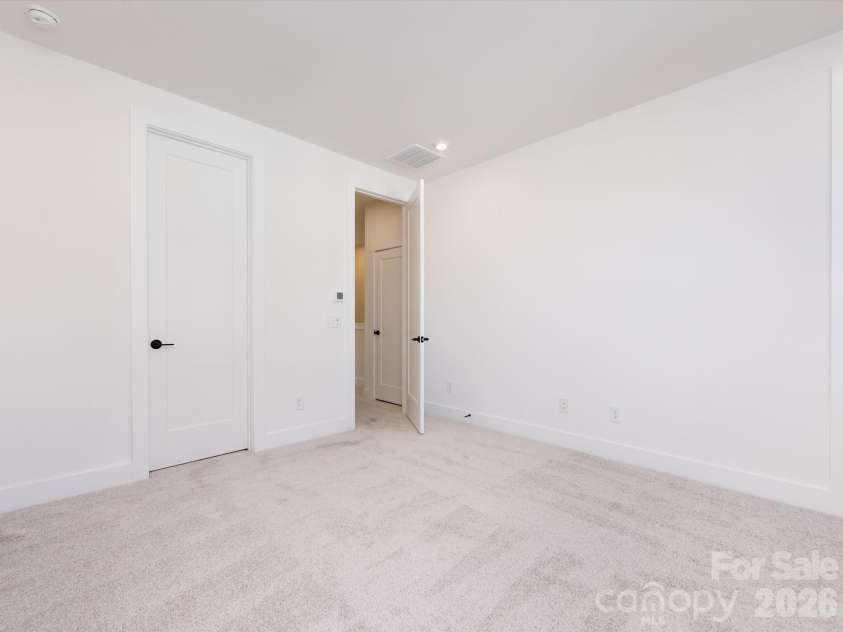 7022 Impulse Court, Charlotte, NC 28205.  MLS# CAR4349977, YatesRealty ID 30446. Light filled primary suite