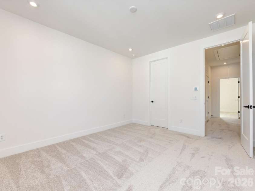 7022 Impulse Court, Charlotte, NC 28205.  MLS# CAR4349977, YatesRealty ID 30446. Light filled primary suite