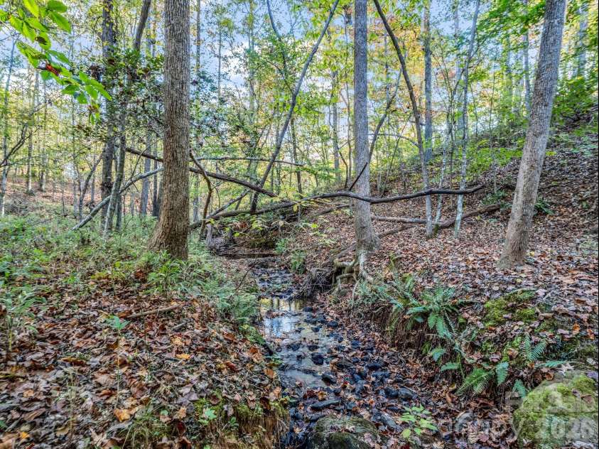 663 Landrum Road, Columbus, NC 28722.  MLS# CAR4315052, YatesRealty ID 30450. Nice Creek on Property!