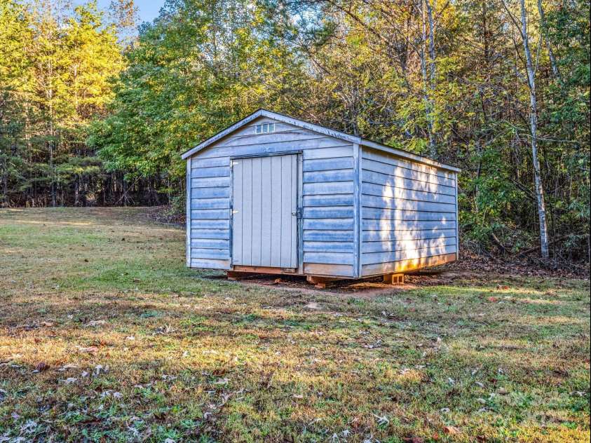 663 Landrum Road, Columbus, NC 28722.  MLS# CAR4315052, YatesRealty ID 30450. Outbuilding conveys