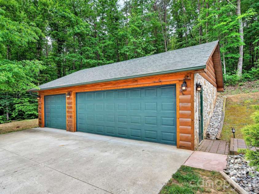 34 Waterfall Drive, Marion, NC 28752.  MLS# CAR4381910, YatesRealty ID 30452. 3 car garage