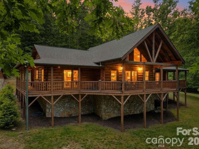 34 Waterfall Drive, Marion, NC 28752.  MLS# CAR4381910, YatesRealty ID 30452. AI twilight effect used on photo