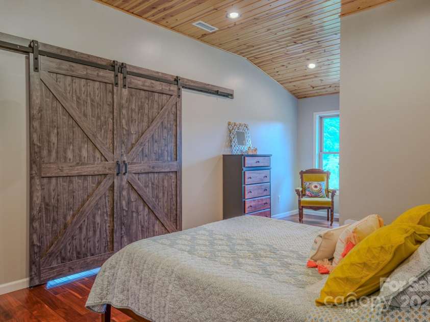 27 Country Beech Lane, Burnsville, NC 28714.  MLS# CAR4288106, YatesRealty ID 30453. Barn doors