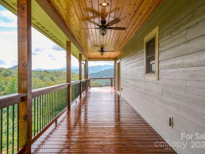 27 Country Beech Lane, Burnsville, NC 28714.  MLS# CAR4288106, YatesRealty ID 30453. Covered porch with amazing views!
