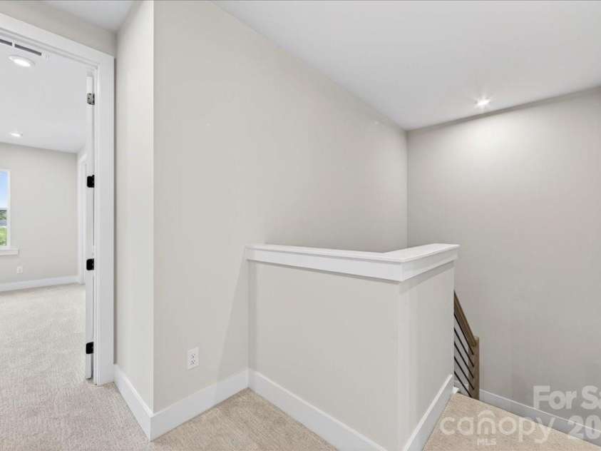 79 Seven Oaks Landing, Belmont, NC 28012.  MLS# CAR4387496, YatesRealty ID 30455. Second floor landing 