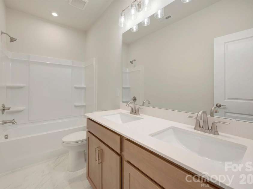 316 Ardmore Drive, Belmont, NC 28012.  MLS# CAR4387503, YatesRealty ID 30456. Dual vanity secondary bathroom