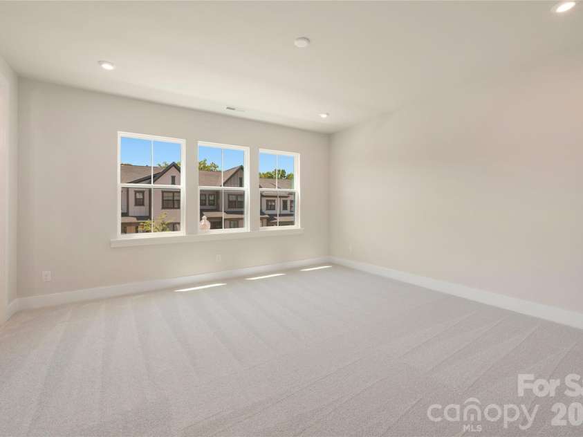 316 Ardmore Drive, Belmont, NC 28012.  MLS# CAR4387503, YatesRealty ID 30456. Light filled primary bedroom