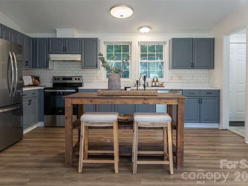 19 Sycamore Street, Asheville, NC 28804.  MLS# CAR4377706, YatesRealty ID 30457. Large Kitchen with ample cabinets and a pantry