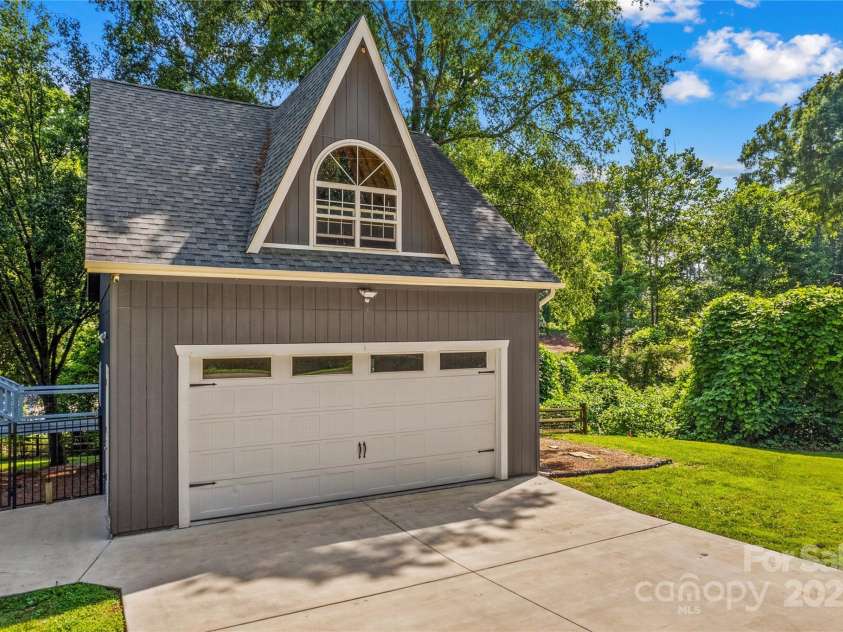 315 Wood Duck Loop, Mooresville, NC 28117.  MLS# CAR4268002, YatesRealty ID 30458. 315 Wood Duck Loop, Mooresville NC MLS 4268002 Waterfront. 24x32 shop with garage door opener and upstairs room.
