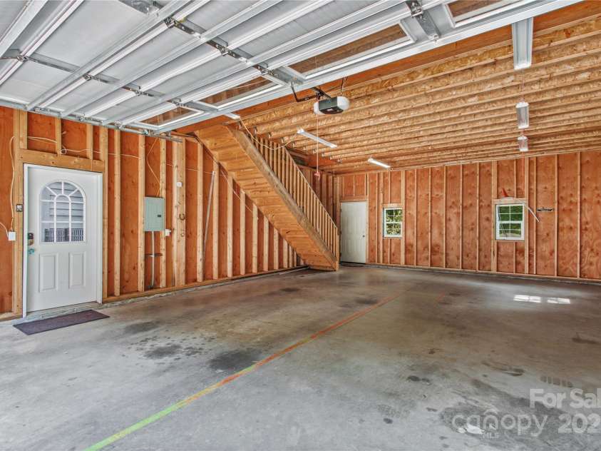 315 Wood Duck Loop, Mooresville, NC 28117.  MLS# CAR4268002, YatesRealty ID 30458. 315 Wood Duck Loop, Mooresville NC MLS 4268002 Waterfront. 24x32 shop with garage door opener and upstairs room.