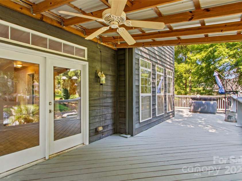 315 Wood Duck Loop, Mooresville, NC 28117.  MLS# CAR4268002, YatesRealty ID 30458. 315 Wood Duck Loop, Mooresville NC MLS 4268002 Waterfront on Lake Norman. Covered back porch with french doors into great room.
