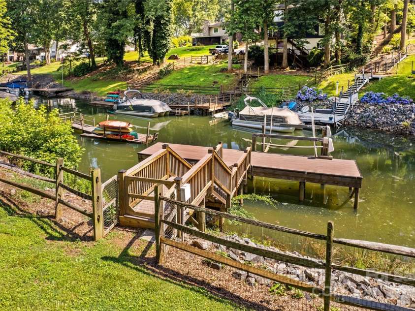 315 Wood Duck Loop, Mooresville, NC 28117.  MLS# CAR4268002, YatesRealty ID 30458. 315 Wood Duck Loop, Mooresville NC MLS 4268002 Waterfront on Lake Norman. Fenced yard, boat lift and dock.