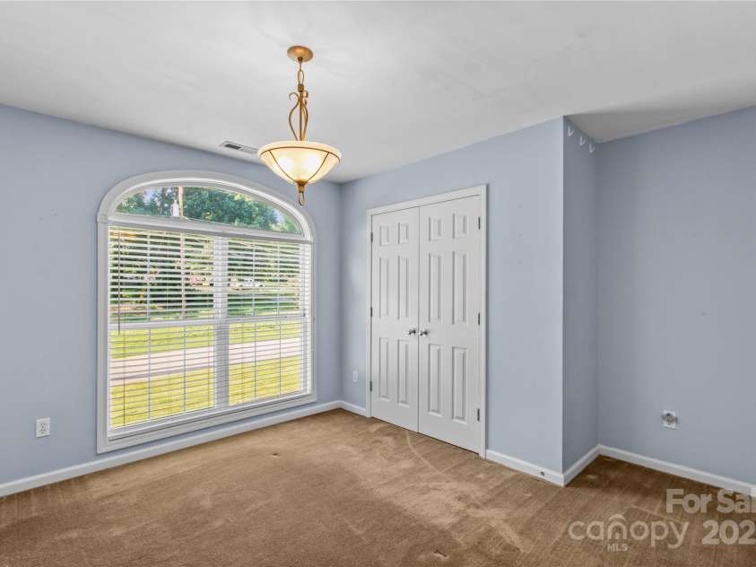 315 Wood Duck Loop, Mooresville, NC 28117.  MLS# CAR4268002, YatesRealty ID 30458. 315 Wood Duck Loop, Mooresville NC MLS 4268002 Waterfront. Upstairs bedroom 2