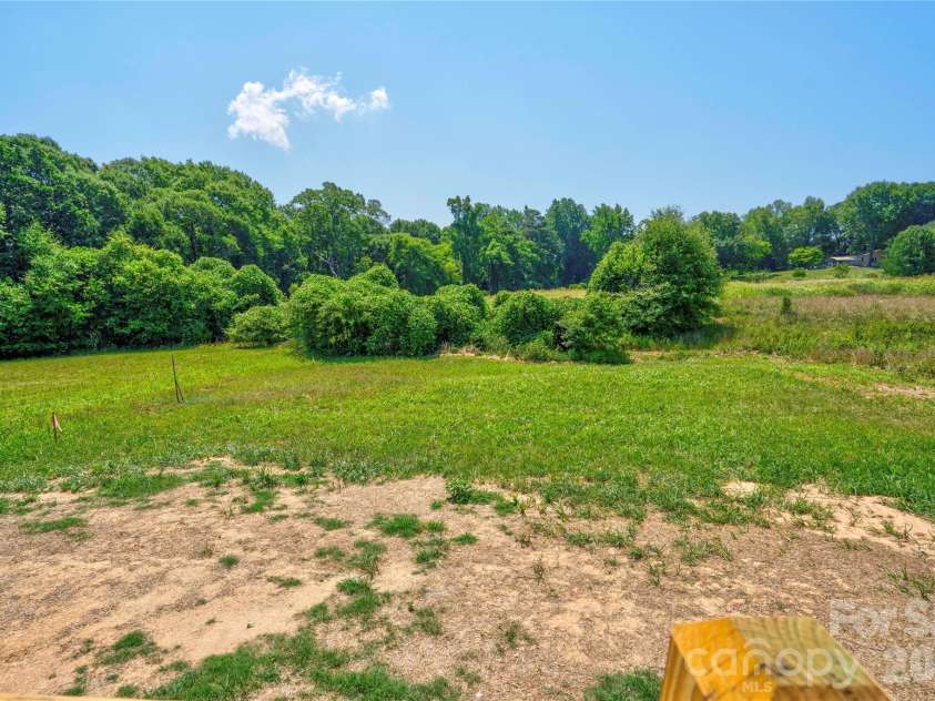 106 Advent Drive, Grover, NC 28073.  MLS# CAR4389271, YatesRealty ID 30459. Back Yard