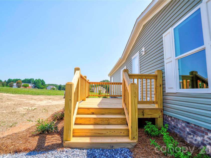 106 Advent Drive, Grover, NC 28073.  MLS# CAR4389271, YatesRealty ID 30459. Front Deck