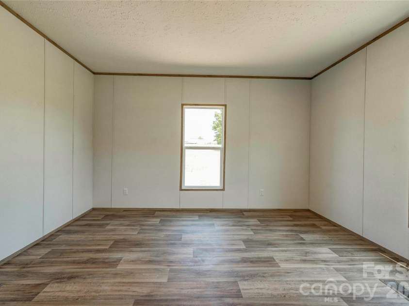 106 Advent Drive, Grover, NC 28073.  MLS# CAR4389271, YatesRealty ID 30459. Primary Bedroom