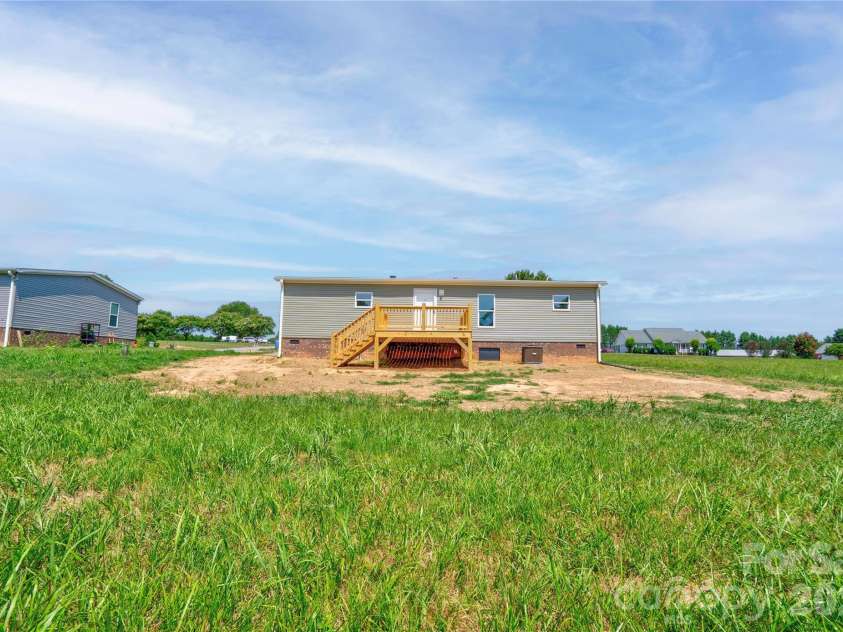 106 Advent Drive, Grover, NC 28073.  MLS# CAR4389271, YatesRealty ID 30459. Rear