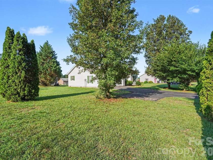 105 3rd Avenue, Hildebran, NC 28637.  MLS# CAR4327231, YatesRealty ID 3046. Beautiful Green Lot: Side View