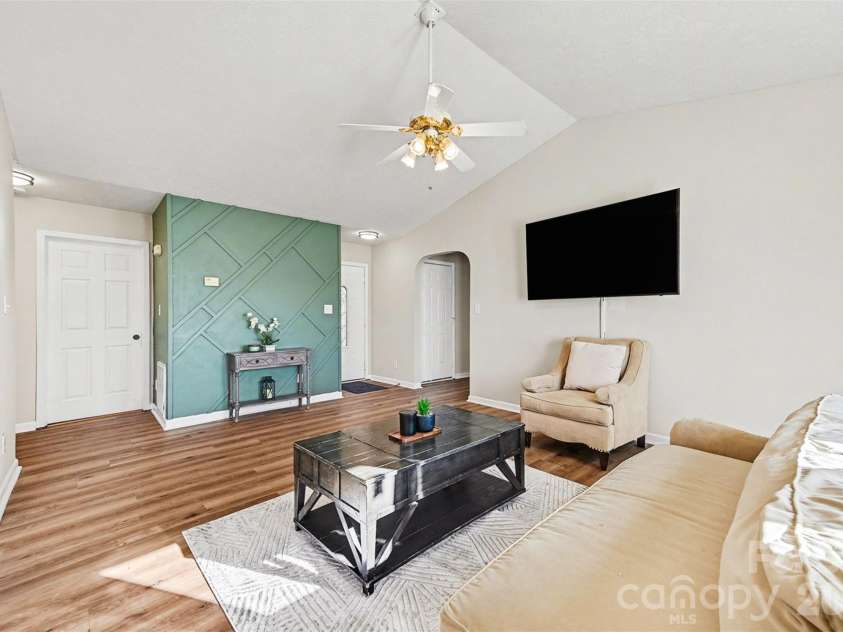 105 3rd Avenue, Hildebran, NC 28637.  MLS# CAR4327231, YatesRealty ID 3046. Living Room Side View