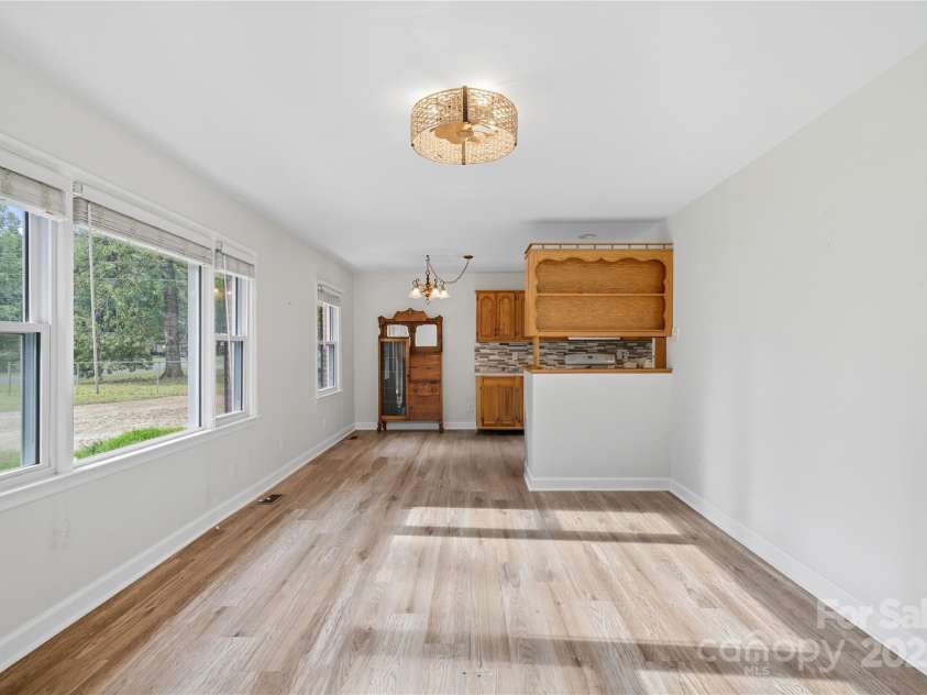 2101 Shady Lane, Monroe, NC 28110.  MLS# CAR4306238, YatesRealty ID 3046. DINING AREA/LIVING ROOM