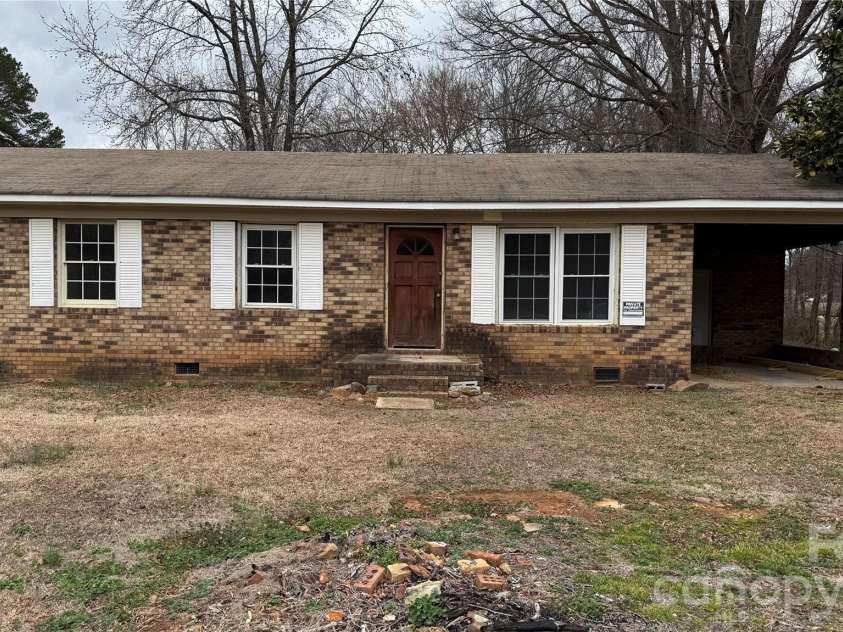 215 Gaddis Road, Oakboro, NC 28129.  MLS# CAR4390880, YatesRealty ID 30461. 