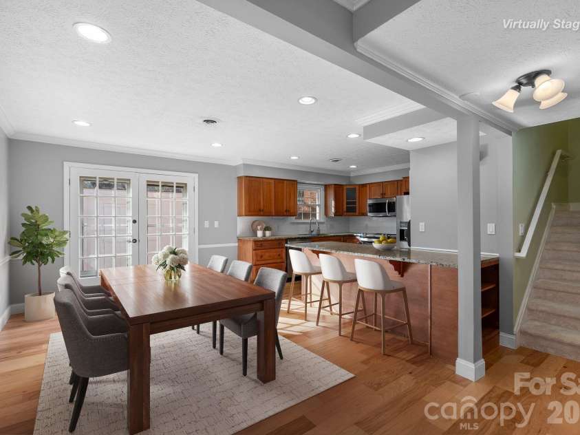 1411 Kensington Road, Hendersonville, NC 28791.  MLS# CAR4339965, YatesRealty ID 30462. Dining & Kitchen area - virtually staged