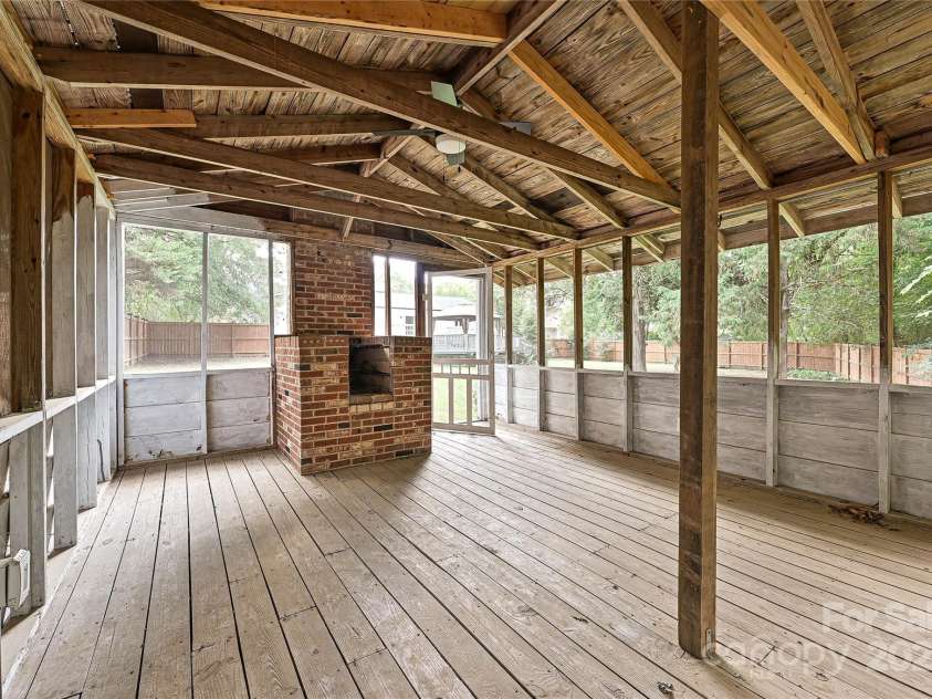 3849 Bon Rea Drive, Charlotte, NC 28226.  MLS# CAR4287106, YatesRealty ID 30466. This space has been described as a low country oyster shack. Imagine roasting oysters on the fireplace. It would make a great play space, potting shed, she shed or man cave. It is wired for power and ight.