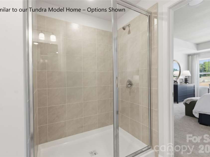 6561 Fire Lily Lane, Charlotte, NC 28216.  MLS# CAR4381611, YatesRealty ID 30467. Oversized Shower