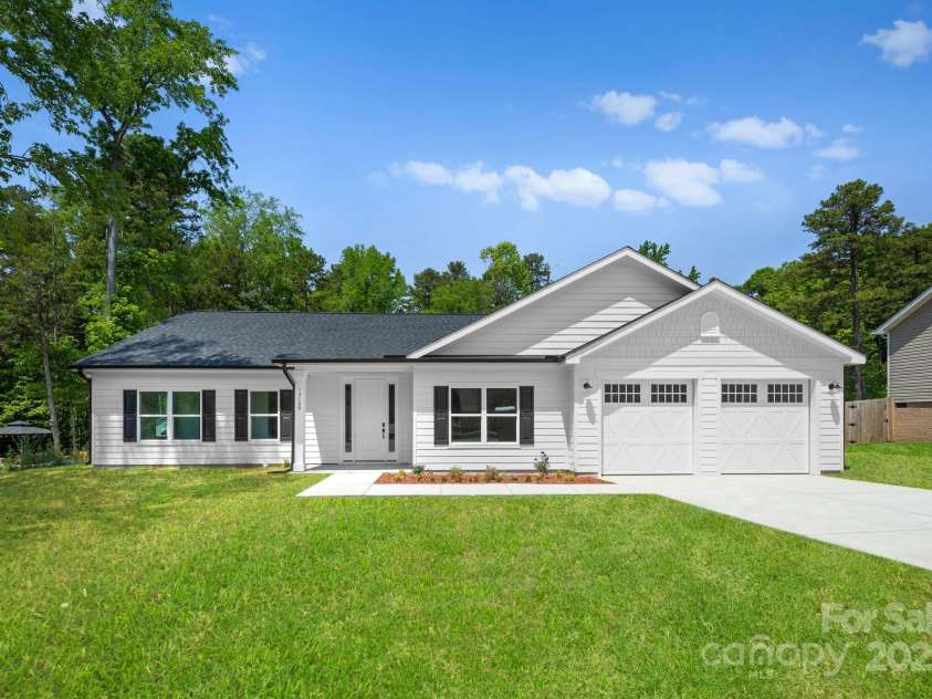 13109 Homewood Drive, Charlotte, NC 28262.  MLS# CAR4254239, YatesRealty ID 30473. Front of the House